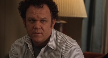 Movie still from “Cyrus” (2010), directed by Jay Duplass – A person wearing a striped shirt; Close Up shot, Over the shoulder angle