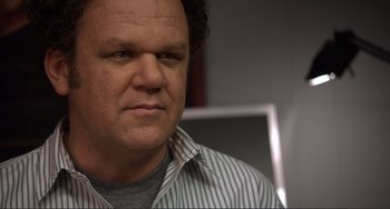 Movie still from “Cyrus” (2010), directed by Jay Duplass – A person wearing a striped shirt; Close Up shot, Over the shoulder angle