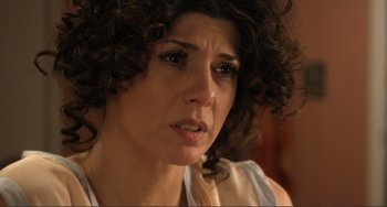 Movie still from “Cyrus” (2010), directed by Jay Duplass – A person with curly hair; Close Up shot, Over the shoulder angle