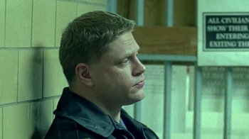 A person wearing a police uniform