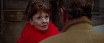 Movie still from “Damien: Omen II” (1978), directed by Mike Hodges – A person talking to another person; Close Up shot, Over the shoulder angle