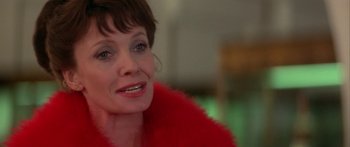 Movie still from “Damien: Omen II” (1978), directed by Mike Hodges – A person wearing a red jacket; Close Up shot, Low angle