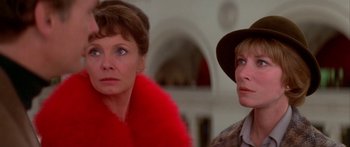 Movie still from “Damien: Omen II” (1978), directed by Mike Hodges – Two women looking at something in the distance; Close Up shot, Low angle