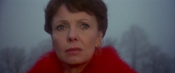 Movie still from “Damien: Omen II” (1978), directed by Mike Hodges – A person wearing a red jacket; Close Up shot, Low angle