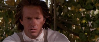 Movie still from “Dances with Wolves” (1990), directed by Kevin Costner – A person with long hair; Close Up shot, Low angle
