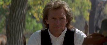 Movie still from “Dances with Wolves” (1990), directed by Kevin Costner – A person with long hair; Close Up shot, Low angle