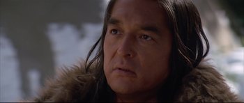 Movie still from “Dances with Wolves” (1990), directed by Kevin Costner – A person with long black hair; Close Up shot, Low angle