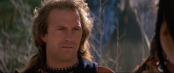 Movie still from “Dances with Wolves” (1990), directed by Kevin Costner – A person with long blonde hair; Close Up shot, Low angle