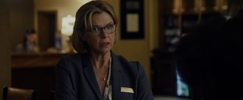 Movie still from “Danny Collins” (2015), directed by Dan Fogelman – An older woman wearing glasses and a jacket; Close Up shot, Over the shoulder angle