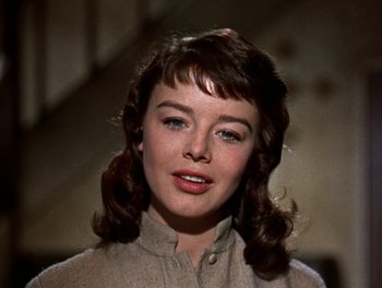 Movie still from “Darby O'Gill and the Little People” (1959), directed by Robert Stevenson – A person wearing a shirt; Close Up shot, Low angle