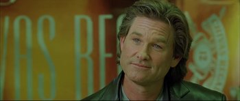 Movie still from “Dark Blue” (2002), directed by Ron Shelton – A person wearing a green jacket; Close Up shot, Low angle