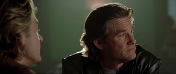 Movie still from “Dark Blue” (2002), directed by Ron Shelton – A person with long hair; Close Up shot, Low angle