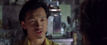 Movie still from “Dark Blue” (2002), directed by Ron Shelton – A person in a kitchen; Close Up shot, Low angle