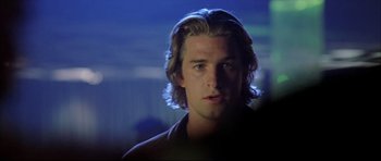 Movie still from “Dark Blue” (2002), directed by Ron Shelton – A person with long blonde hair; Close Up shot, Over the shoulder angle