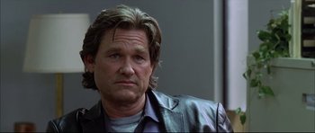 Movie still from “Dark Blue” (2002), directed by Ron Shelton – A person wearing a leather jacket; Close Up shot, Low angle