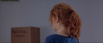 Movie still from “Dark Blue” (2002), directed by Ron Shelton – A person with red hair; Close Up shot, Over the shoulder angle