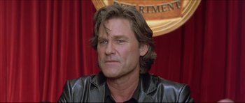 Movie still from “Dark Blue” (2002), directed by Ron Shelton – A person wearing a leather jacket; Close Up shot, Low angle