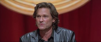 Movie still from “Dark Blue” (2002), directed by Ron Shelton – A person wearing a leather jacket; Close Up shot, Low angle