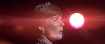 Movie still from “Darling Lili” (1970), directed by Blake Edwards – A person wearing a tiara; Close Up shot, Low angle