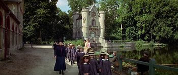 Movie still from “Darling Lili” (1970), directed by Blake Edwards – A group of children are walking down the street; Wide shot, High angle