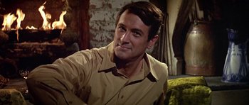 Movie still from “Darling Lili” (1970), directed by Blake Edwards – A person wearing a brown shirt; Close Up shot, Low angle