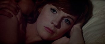 Movie still from “Darling Lili” (1970), directed by Blake Edwards – A woman's face with green eyes; Close Up shot, High angle