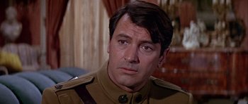 Movie still from “Darling Lili” (1970), directed by Blake Edwards – A person wearing a military uniform; Close Up shot, Over the shoulder angle