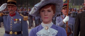 Movie still from “Darling Lili” (1970), directed by Blake Edwards – A person wearing a hat; Close Up shot, Low angle