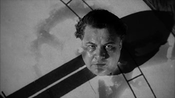 Movie still from “David and Lisa” (1962), directed by Frank Perry – Black and white photograph of a man in a swimming pool; Close Up shot, Overhead angle