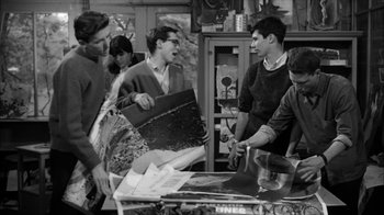 Movie still from “David and Lisa” (1962), directed by Frank Perry – Black and white photograph of a group of young men; Medium shot, High angle