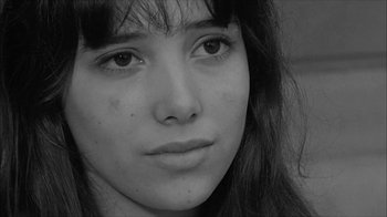 Movie still from “David and Lisa” (1962), directed by Frank Perry – A young woman's face; Close Up shot, High angle