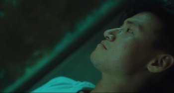 Movie still from “Days of Being Wild” (1990), directed by Kar-Wai Wong – A young man looking up into the sky; Close Up shot, Low angle
