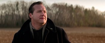 Movie still from “Days of Thunder” (1990), directed by Tony Scott – A person wearing a jacket; Close Up shot, Low angle