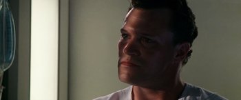 Movie still from “Days of Thunder” (1990), directed by Tony Scott – A person looking up at the sky; Close Up shot, Low angle