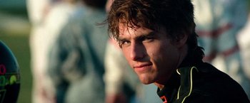 Movie still from “Days of Thunder” (1990), directed by Tony Scott – A young man's face; Close Up shot, Over the shoulder angle