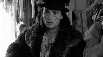 Movie still from “Dead Man” (1995), directed by Jim Jarmusch – Johnny depp in a black and white photo; Close Up shot, Over the shoulder angle