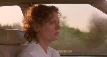 Movie still from “Dead Man Walking” (1995), directed by Tim Robbins – A woman sitting in a car looking out the window; Close Up shot, Low angle