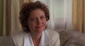 Movie still from “Dead Man Walking” (1995), directed by Tim Robbins – A person sitting on a couch; Close Up shot, Over the shoulder angle