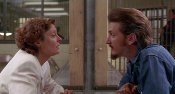 Movie still from “Dead Man Walking” (1995), directed by Tim Robbins – A man and a woman looking at each other; Close Up shot, Over the shoulder angle