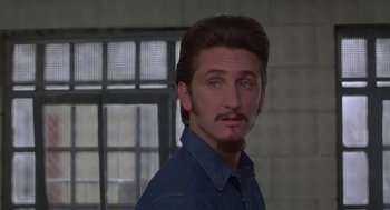 Movie still from “Dead Man Walking” (1995), directed by Tim Robbins – A person wearing a shirt; Close Up shot, Over the shoulder angle