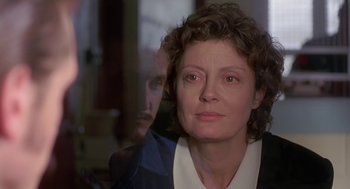 Movie still from “Dead Man Walking” (1995), directed by Tim Robbins – A person looking out of a window; Close Up shot, Over the shoulder angle