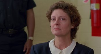 Movie still from “Dead Man Walking” (1995), directed by Tim Robbins – A person sitting in a room; Close Up shot, Low angle