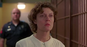 Movie still from “Dead Man Walking” (1995), directed by Tim Robbins – A person wearing a white shirt; Close Up shot, Low angle