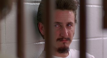 Movie still from “Dead Man Walking” (1995), directed by Tim Robbins – A person in a jail cell; Close Up shot, Low angle