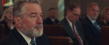 Movie still from “Dirty Grandpa” (2016), directed by Dan Mazer – A person wearing a suit and tie; Close Up shot, Over the shoulder angle