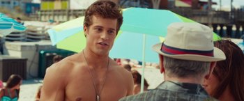 Movie still from “Dirty Grandpa” (2016), directed by Dan Mazer – A young man with a hat and a necklace talking to an older man; Close Up shot, Over the shoulder angle