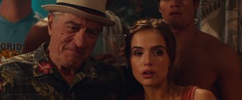 Movie still from “Dirty Grandpa” (2016), directed by Dan Mazer – A man and a woman are sitting next to each other; Close Up shot, Over the shoulder angle