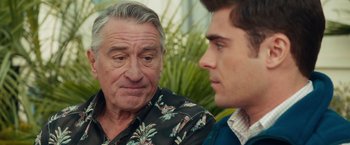 Movie still from “Dirty Grandpa” (2016), directed by Dan Mazer – A man and a boy are sitting next to each other; Close Up shot, Over the shoulder angle