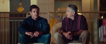Movie still from “Dirty Grandpa” (2016), directed by Dan Mazer – Two men sitting next to each other in a room; Medium shot, Over the shoulder angle