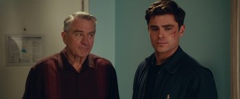 Movie still from “Dirty Grandpa” (2016), directed by Dan Mazer – Two men standing next to each other in front of a wall; Close Up shot, Over the shoulder angle